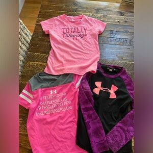 Girls Size 5 UA shirts. Set of 3. 2 short sleeve tees and one long sleeve